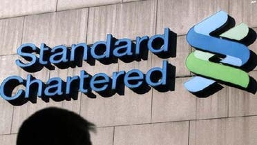 Standard Chartered expects to pay $330 million to settle a case with U.S. regulators for breaking sanctions on Iran. (Reuters)