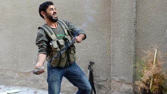 Syria rebels clash with army and Palestinian fighters