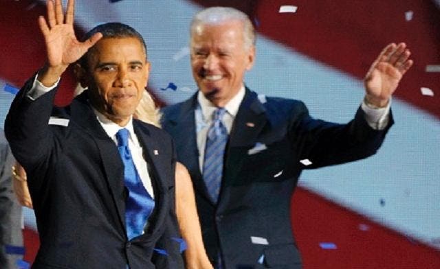 U.S. President Barack Obama and Vice President Joe Biden (R) celebrate at their election night victory rally in Chicago November 6, 2012. (Reuters)