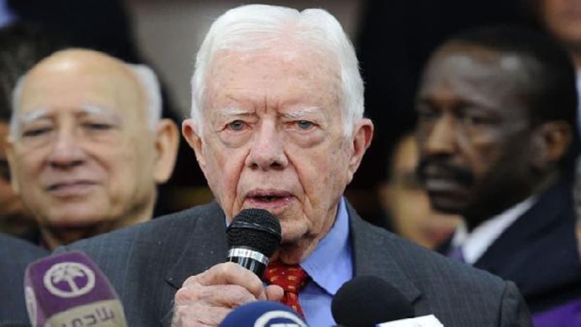 Former U.S. President Jimmy Carter speaks to reporters in Cairo. (Reuters)