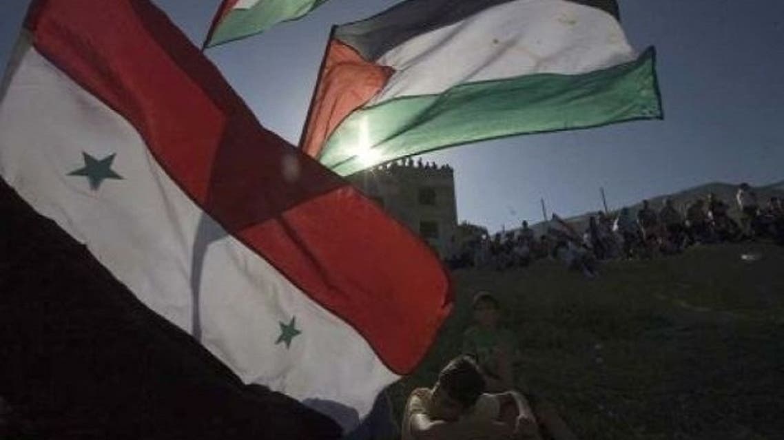 yarmuk palestinian refugee camp syria hanging death revolt