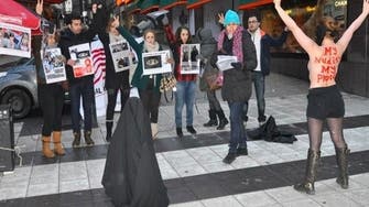 Strip and strike: Iranian activists strip to protest against hijab