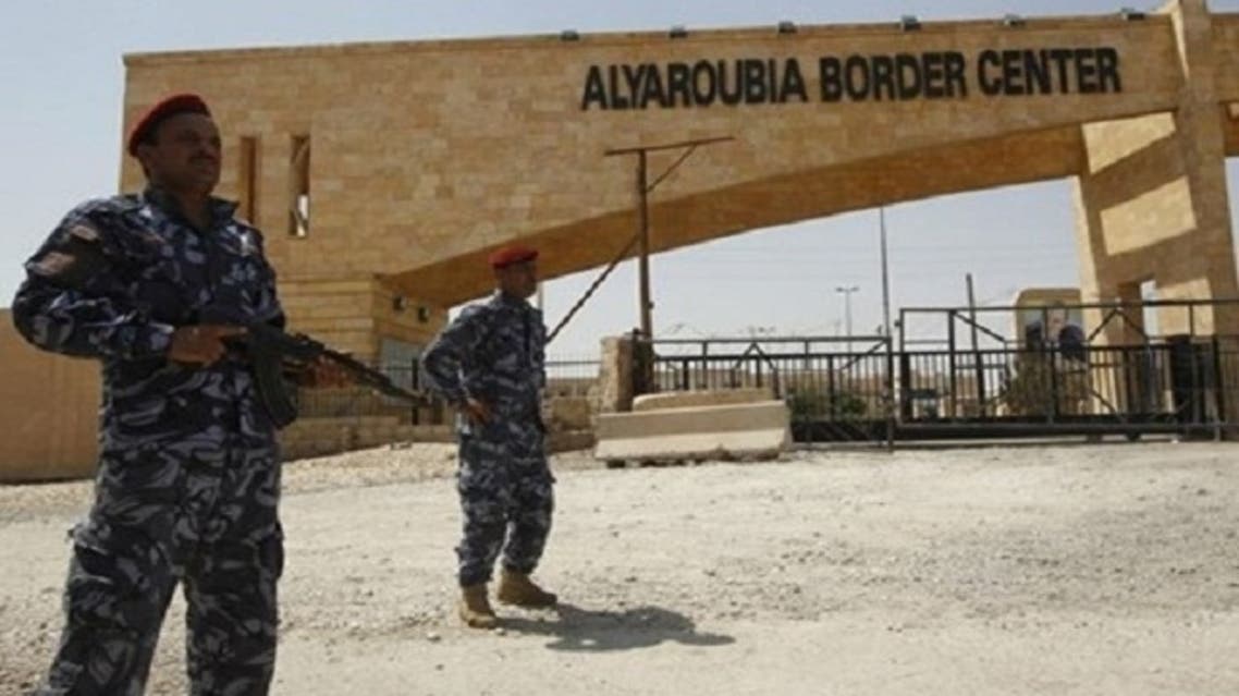 Iraqi Police stand guard the Yaarubiyeh border crossing. (Reuters)
