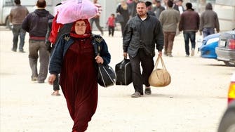 Syria to renew passports, in apparent concession