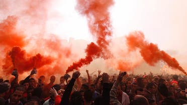 Al-Ahly fans, also known as “Ultras”, shout slogans against the Interior Ministry in front of the Al-Ahly club after hearing the final verdict of the 2012 Port Said massacre in Cairo March 9, 2013. (Reuters)