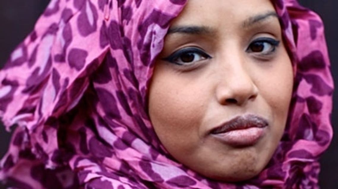 A woman wearing a colorful hijab in one of Sara Shamsavari’s pictures for the Women of the World (WOW) exhibition at the Royal Festival Hall in London. (Photo courtesy Sara Shamsavari)