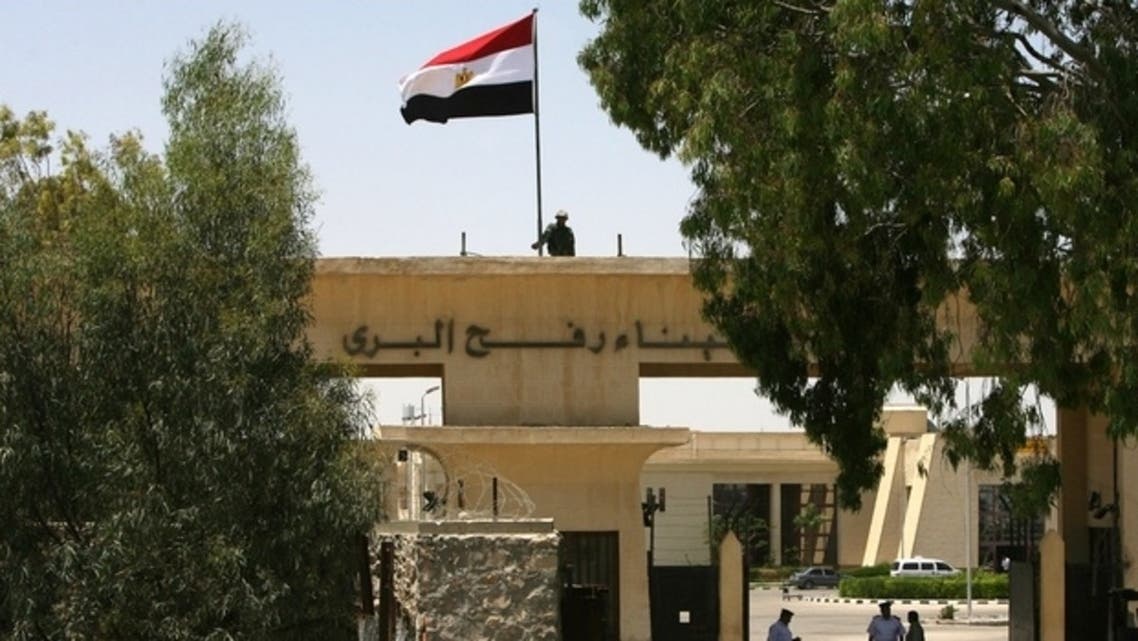 Egyptian border policemen stands guard on the Egyptian side of the Palestinian Rafah border crossing in the southern Gaza Strip. (AFP)