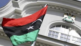 Gunmen surround Libyan ministry in protest at Qaddafi-era officials