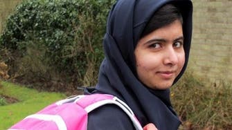 Pakistan’s Malala in school for first time since shooting