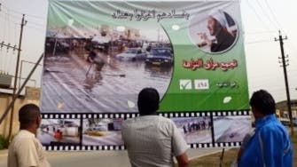 Iraq campaigns kick off, with often bizarre posters 	