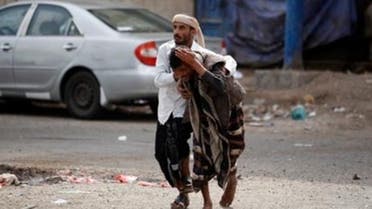 A supporter of the separatist Southern Movement is helped by another supporter after he was injured during clashes with security forces in the southern Yemeni port city of Aden. (Reuters)