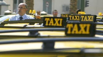 Egypt taxi drivers storm finance ministry gates 