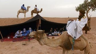 Desert nomads marvel at water purifying device