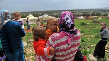 Syrian refugees near Afrin, on the Syria-Turkey border. (AFP)