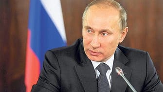 Russia's Putin urges peace talks to end the Syrian 'massacre'