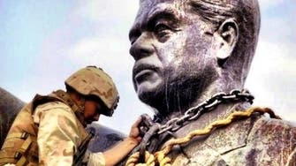 Bottom profits: cashing in on a piece of Saddam’s fallen statue