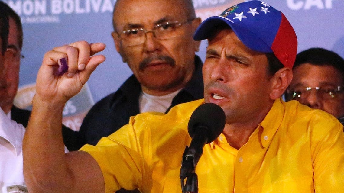 Venezuela's opposition leader Henrique Capriles refused on Monday to accept ruling party candidate Nicolas Maduro's narrow election victory and demanded a recount (Reuters)