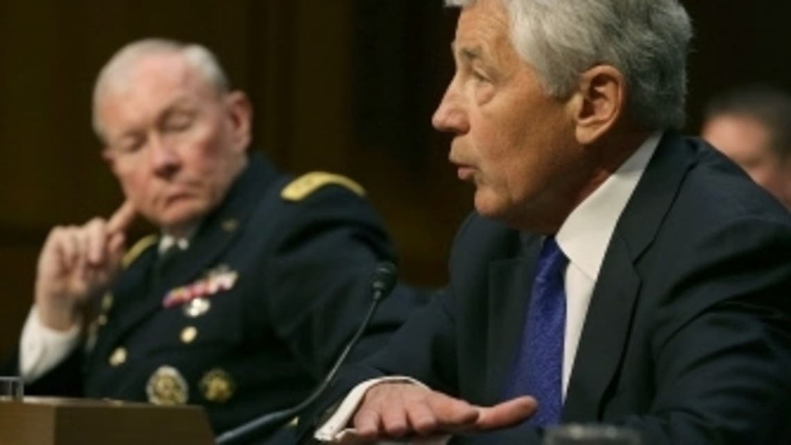Defense Secretary Chuck Hagel (R) and Chairman of the Joint Chiefs of Staff Gen. Martin Dempsey testify during a Senate Armed Services Committee hearing on Capitol Hill, April 16, 2013 in Washington, DC. (Reuters)