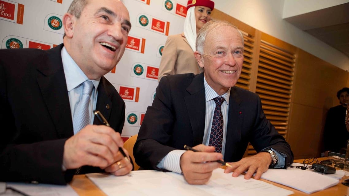 Jean Gachassin, president of the French Federation of Tennis and Tim Clark, president of Emirates (right) signed a five-year sponsorship agreement. (Image courtesy Emirates)