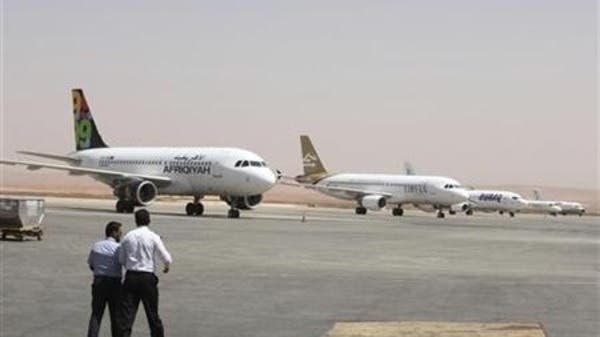 Libyan plane shot at as it lands at Tripoli