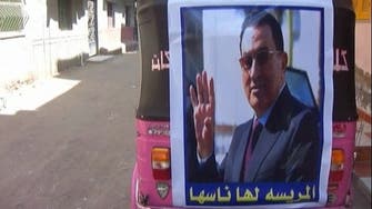 Posters of ousted Egyptian president appear in Mursi’s hometown