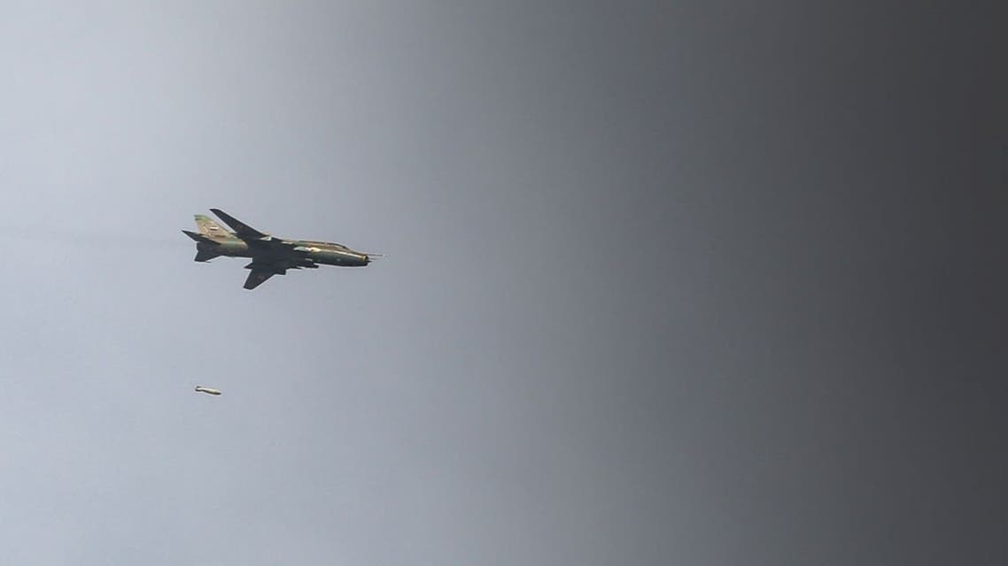 A Sukhoi-22 fighter jet of the Syrian air force drops a 500lb freefall bomb over the town of Maraat al-Numan, on November 17, 2012. After months of repeated airstrikes and artillery barrages by Syrian forces outside Maraat al-Numan, fighting for this crucial town on the Aleppo-Damascus highway shows little sign of abating. The Free Syrian Army control the town, but the Syrian army are free to bombard it at will. (John Cantlie/AFP/Getty Images