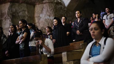 gyptian Christian Coptic worshippers attend a function on April 25, 2013 at the St Samaans (Simon) Church also known as the Cave Church in the Mokattam village, nicknamed "Garbage City," in Cairo. (Reuters)