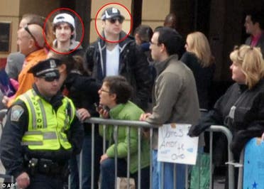 Boston bombing suspects Tamerlan Tsarnaev, circled right, and Dzhokhar Tsarnaev, circled left, pictured during the marathon. (AP)