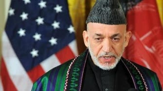 Afghan president denies CIA cash goes to warlords 