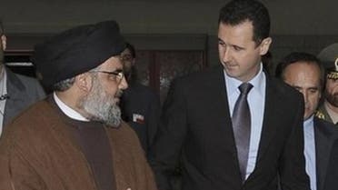 Hezbollah leader Hassan Nasrallah and Syrian President Bashar Assad