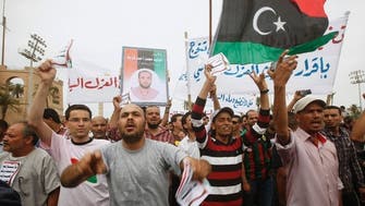Libya gunmen besieging ministries demand government quits 