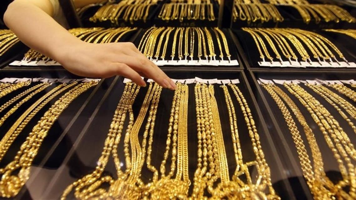 Gold prices eased by 0.6 percent after rising to a near three-week high of $1,487.80 on Friday. (Reuters)