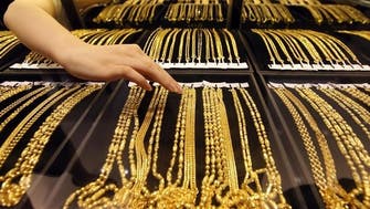 Gold prices lower as equities make gains