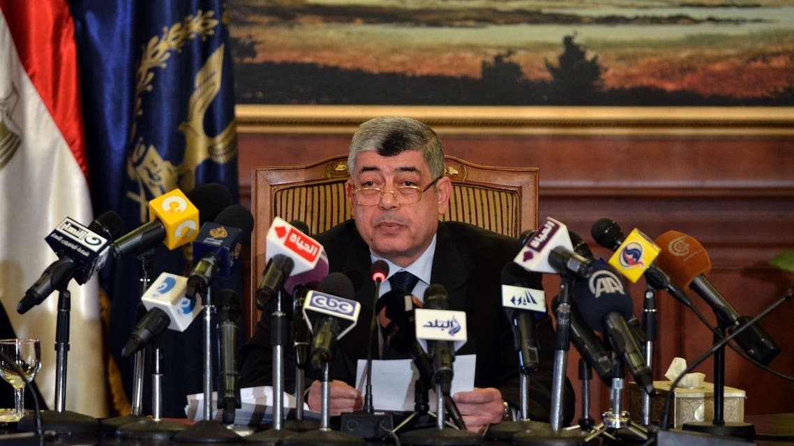 Egyptian Interior Minister Mohammed Ibrahim holds a press conference at his office in Cairo on May 11, 2013. (AFP)