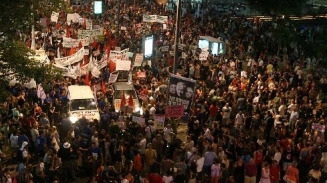 Israelis march in the center of Tel Aviv on July 30, 2011. Photo by AFP
