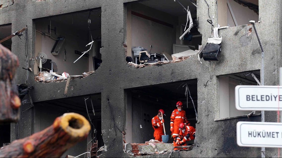 Search and rescue team members work on one of the scenes of the twin car bomb attacks in the town of Reyhanli of Hatay province near the Turkish-Syrian border May 12, 2013. (Reuters)