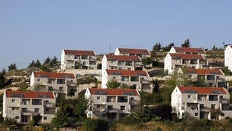 Watchdog: Israel trying to legalize settlements   