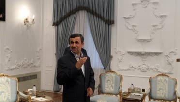 Iranian President Mahmoud Ahmadinejad (C) is pictured in Tehran on May 4, 2013.