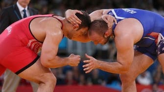 Iran out of Los Angeles wrestling meet with U.S.   