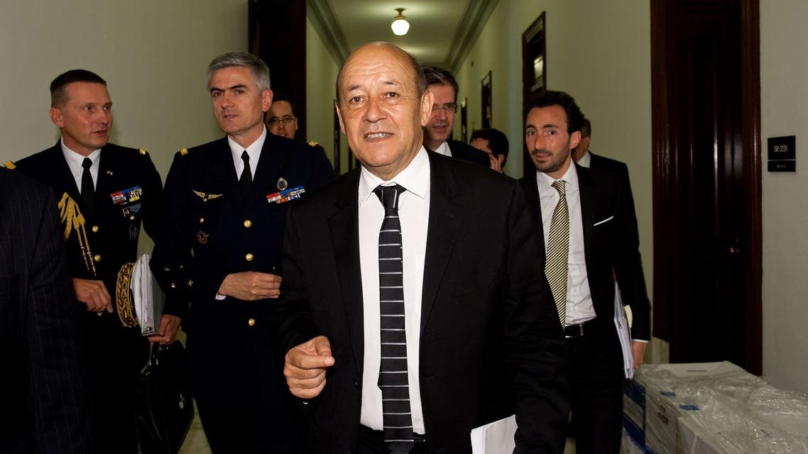 French Defense Minister Jean-Yves Le Drian leaves a US Senate Armed Services Committee informal. (AFP)