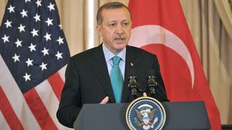 Report: Turkey PM to sue opposition leader over Assad comparison