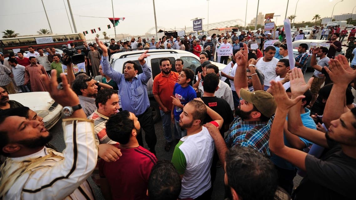 People demonstrate to demand the country's National Congress and transitional government ensure the police and the army carry out their jobs, and that militias are dismantled, in Benghazi May 17, 2013. (Reuters)