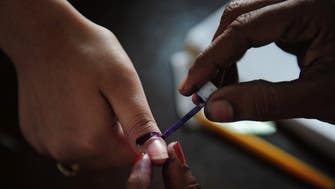 Pakistan holds repeat poll despite killing 