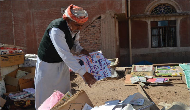 In addition to holy books, Badi collects newspapers, wedding invitations and pamphlets—any material on which the name of God has been written. (Photo Courtesy: Yemen Times)