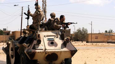 Soldiers in military vehicles proceed towards al-Jura district in El-Arish city from Sheikh Zuwaid, around 350 km (217 miles) northeast of Cairo May 21, 2013. (REUTERS)