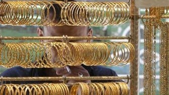 Gold slips on speculation that Fed may cut stimulus