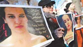 Defending her name: Tunisia’s topless activist gets pepper-spray charge