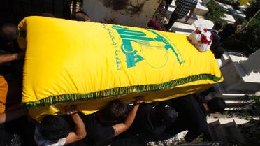 Supporters of Hezbollah and relatives of Saleh Ahmed Sabagh, a Hezbollah member, carry the coffin during his funeral in the port-city of Sidon, southern Lebanon May 22, 2013. (Reuters)