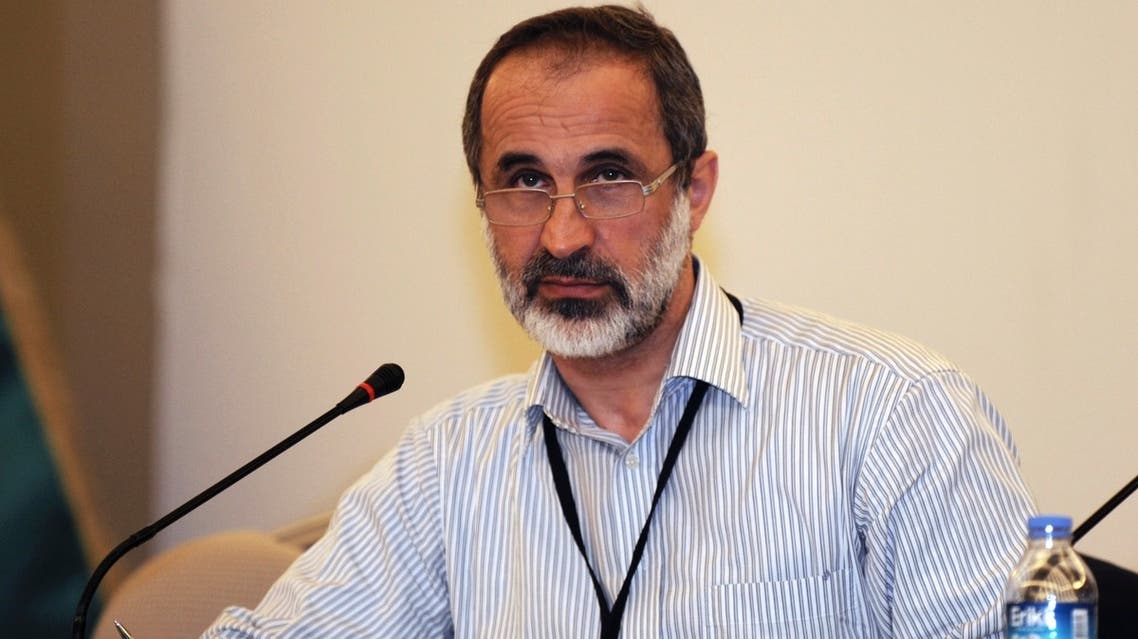 Former leader of the Syrian National Coalition (SNC) Moaz Alkhatib speaks during a meeting in Istanbul May 23, 2013. REUTERS