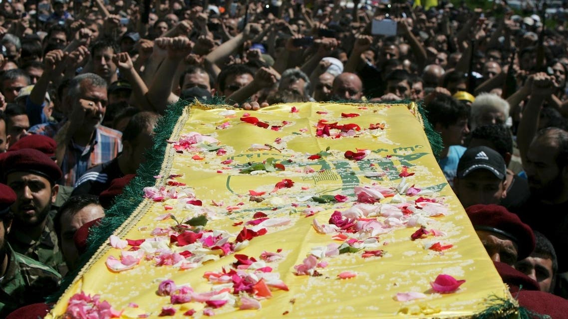 Supporters of Hezbollah and relatives of Hezbollah members attend the funeral of a Hezbollah fighter who died in the Syrian conflict in Ouzai in Beirut May 26